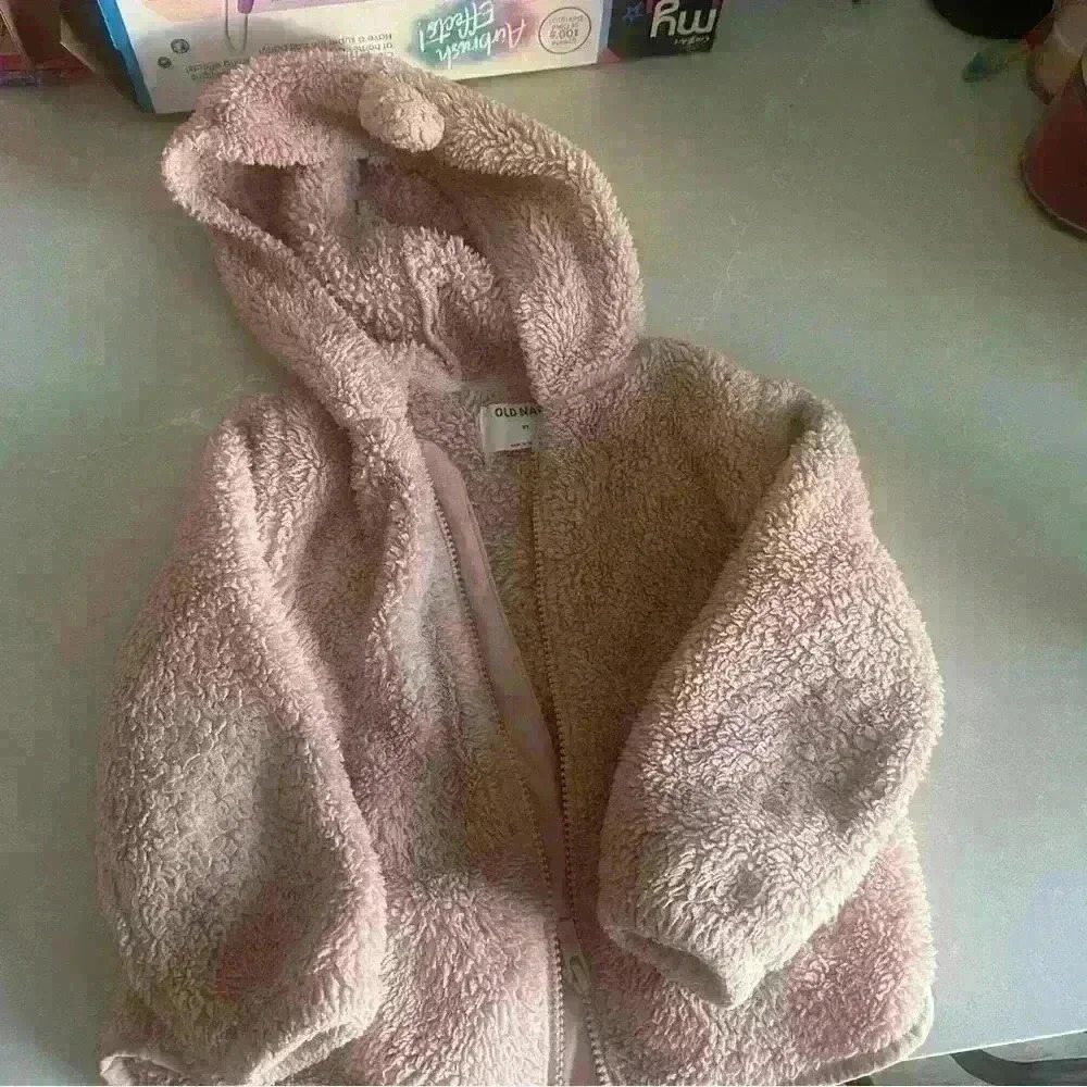 Pink cozy jacket for toddlers.